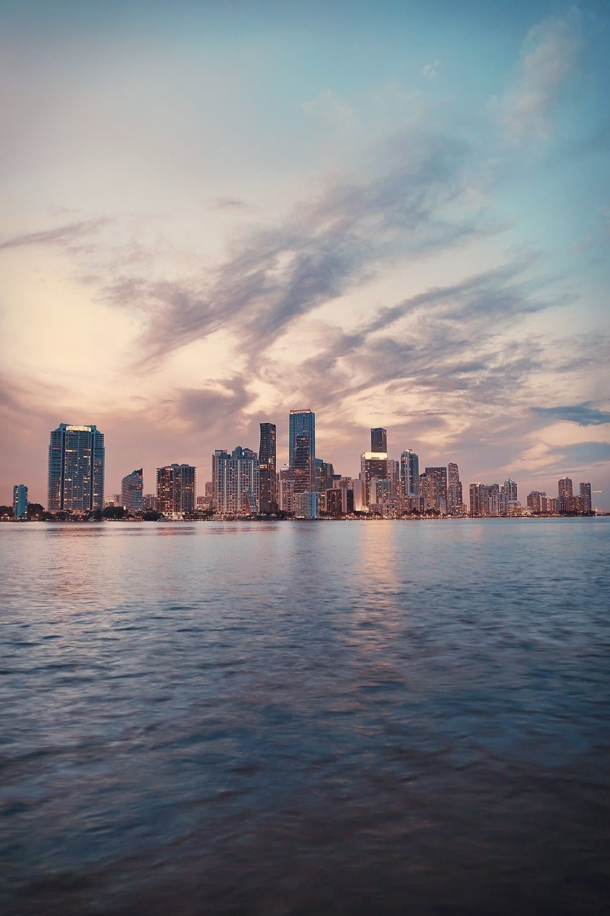The Miami skyline across the water at dusk